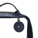 Necessaire organizadora feminina de couro legítimo Luísa Média By Tascheers com fechamento em zíper e acabamento artesanal premium.