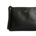 Necessaire organizadora de couro legítimo Maria Média By Tascheers com fechamento em zíper superior e acabamento artesanal premium.