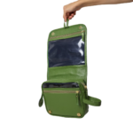Necessaire de couro legítimo Natache By Tascheers com fechamento em zíper metálico e acabamento artesanal premium.