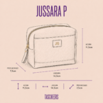 Necessaire de couro legítimo Jussara Pequena By Tascheers com formato compacto estruturado, fechamento em zíper metálico e acabamento artesanal premium.