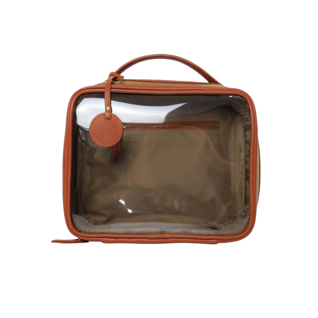 Necessaire de couro legítimo Miguel Média By Tascheers com formato retangular estruturado, fechamento em zíper metálico e acabamento artesanal de alto padrão.
